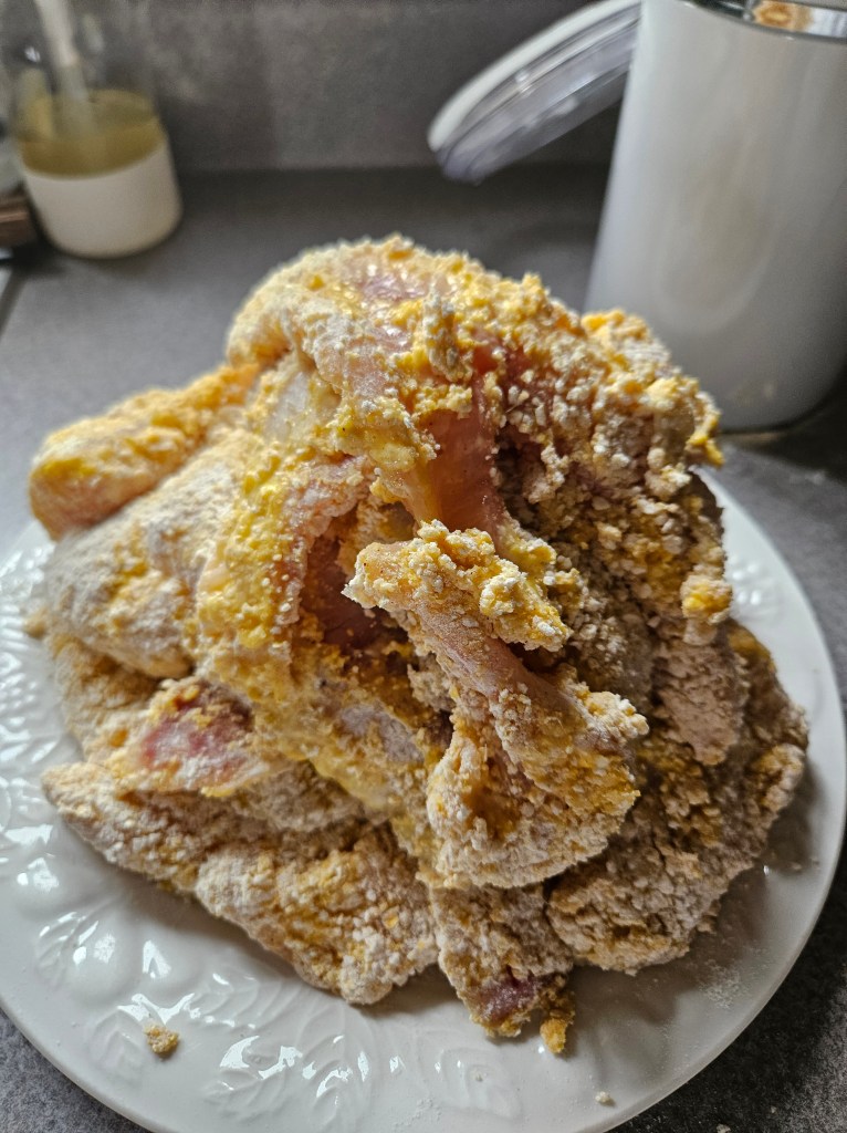 Pile of breaded fish